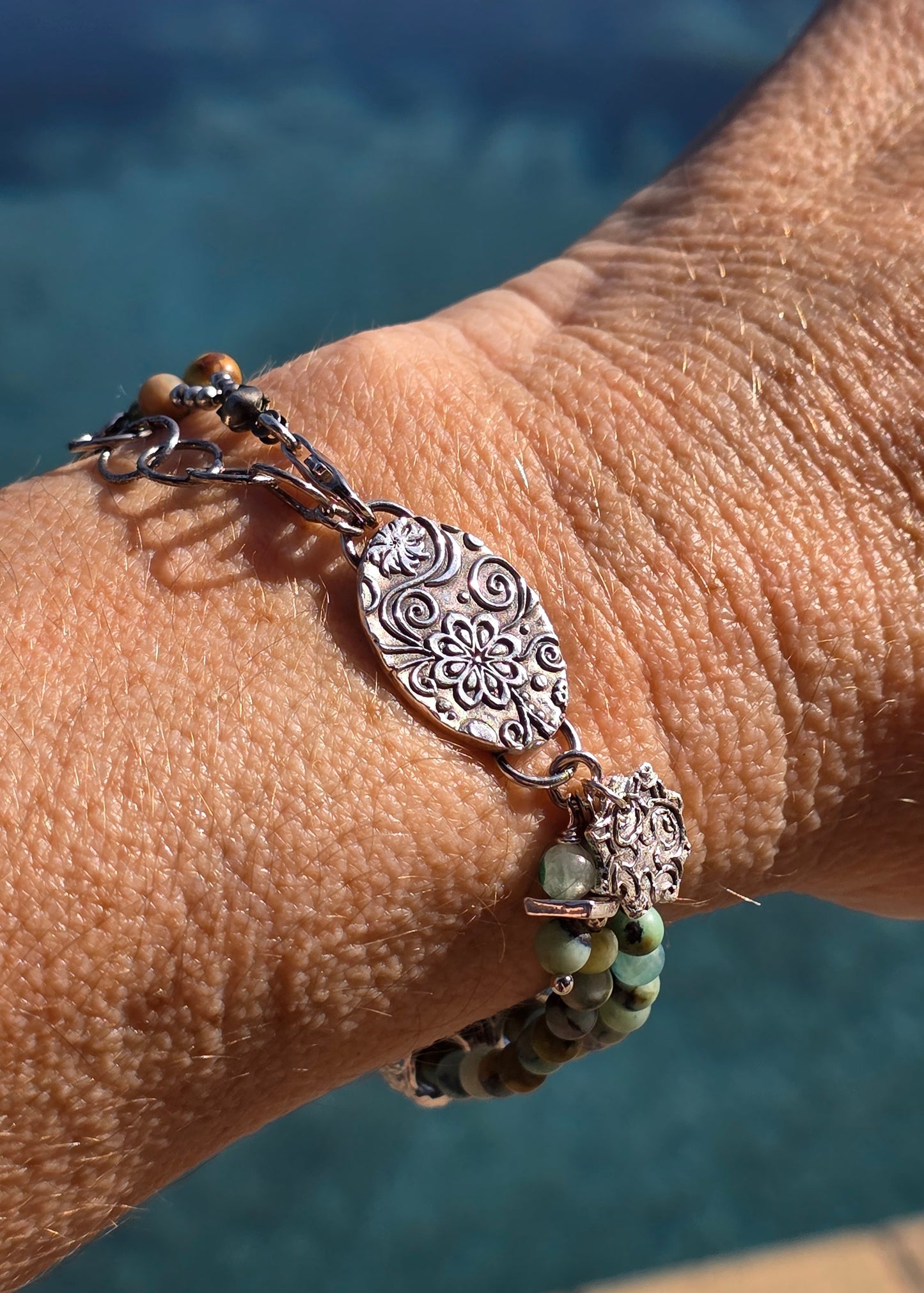 2 strand chrysocolla beaded bracelet with fines silver charms and "floating" silver beads