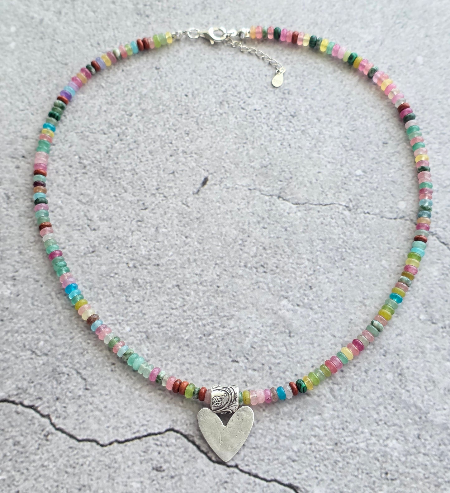 Multi gemstone necklace with fine silver heart and floral bail