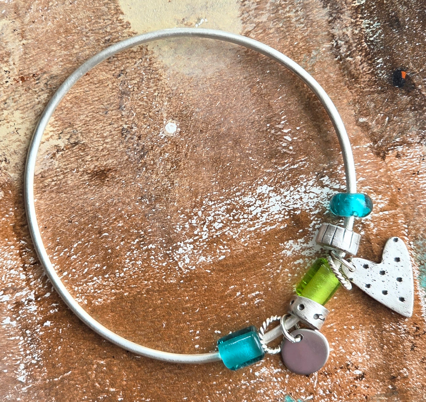 Lampwork bead and fine silver heart bangle bracelet