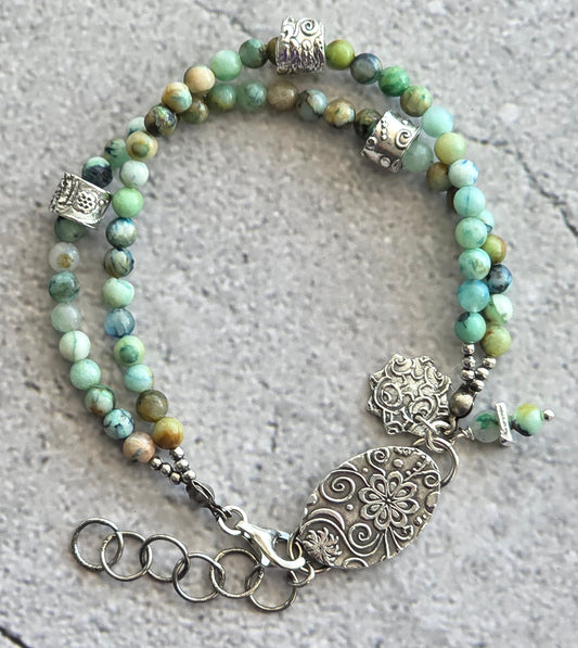 2 strand chrysocolla beaded bracelet with fines silver charms and "floating" silver beads