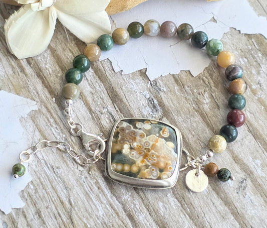 Bezel set Ocean Jasper with Picaso Jasper beads and lots of charms!