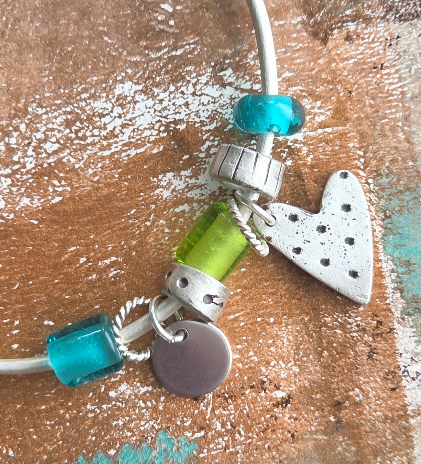 Lampwork bead and fine silver heart bangle bracelet